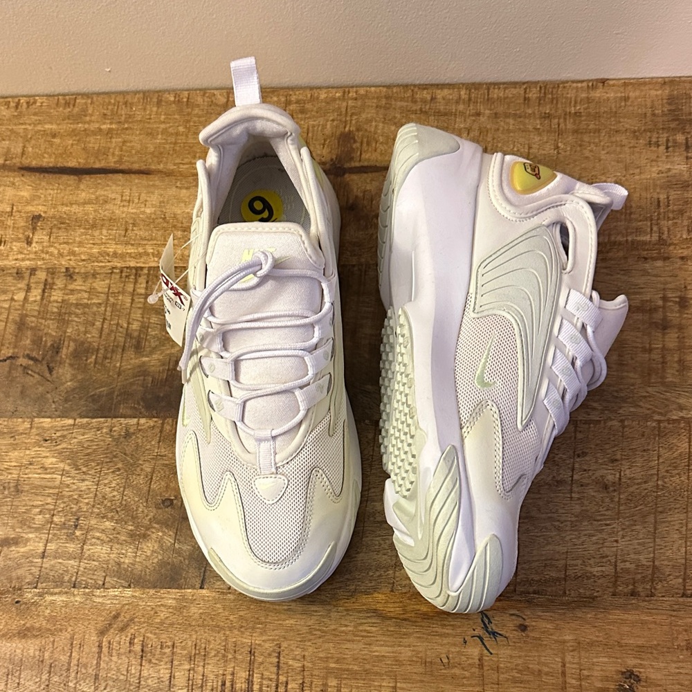 Nike White Sneakers with Pale Pink Accents